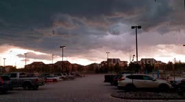 Dense hail hammers Colorado parking lot