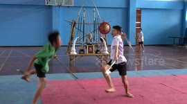 Pupils learn ancient sword fighting martial art in their PE lessons at Thai school