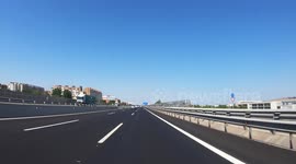 point of view from a car driving on a  motorway in spain