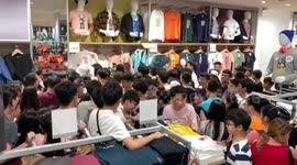 Dozens of Malaysian shoppers storm into Uniqlo store for its latest t-shirt