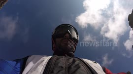 Wingsuiter flies Into a crack