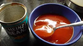 A man says he's bean had after opening a can of Heinz Baked Beans - and found ONE bean inside