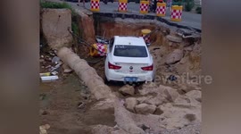 Six-year-old reverses car into hole after father left without pulling brake