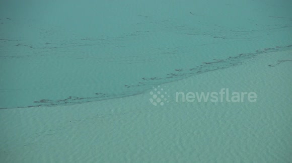 Apparent oil spill in Bahamas after Hurricane Dorian seen from air