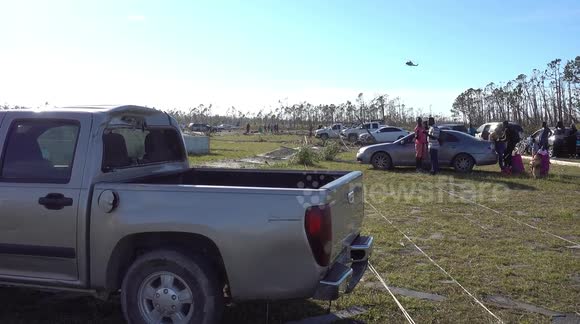 Relief Helicopter lands at Destroyed Airport in Treasure Cay Abaco after Hurricane Dorian