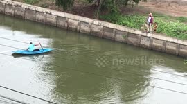 Hero schoolboy paddles kayak across canal to save drowning kitten