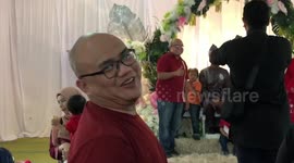 Hilarious moment Malaysian man bumps into his doppelganger at friend's wedding
