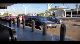Strange scene as people seen arriving at LAX in a hearse