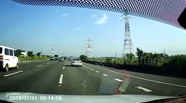 Car Creates Dangerous Exhaust Smokescreen In Taiwan