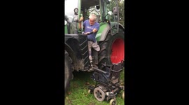 Heartwarming moment UK farmer with double amputation and loss of left arm climbs back into his tractor on his own