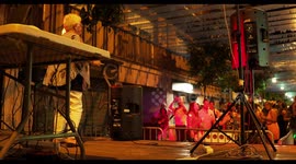 Cool older lady dancing at Poblenou street festival, barcelona