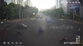 Strong wind blows giant moon-themed balloon onto busy Chinese road