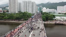 Drone footage shows Hong Kong protesters barricading themselves in on a bridge in Sha Tin during anti-government rally