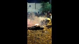 Man rescued after tripping over walking on hot coals in south India