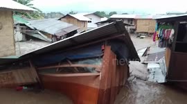 Dramatic moment homes are destroyed and washed away by floods in the Philippines