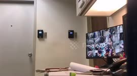 Light-fingered bank worker caught on hidden camera pocketing cash in Thailand