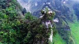 Ancient Chinese cottage spotted on top of mountain in China's Suiyang