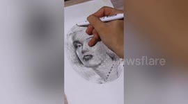 Chinese artist draws impressive portraits with one continuous spiral