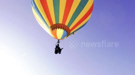 'Sky's the limit': Thrill-seeking couple set record for countries flown over in hot air balloon