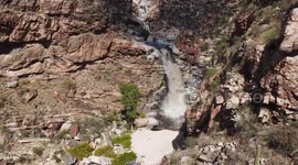 Flash flood turns dry mountain into raging 75-foot waterfall in Arizona