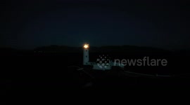 Beautiful Drone Footage of Atmospheric Twilight With Flashing Lighthouse &n Planet Jupiter