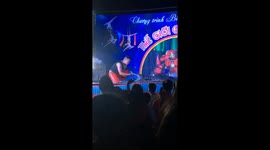 The man performing put his hand and head into the mouth of the crocodile