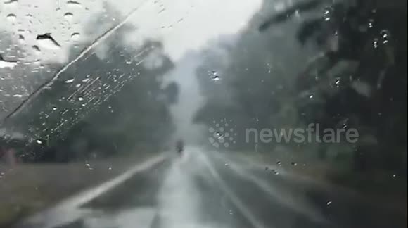 West Sumatra residents see 'first rainfall for a month' during Indonesia's haze crisis