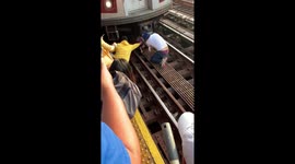 Bystanders in New York rescue girl from train tracks after dad's suicide