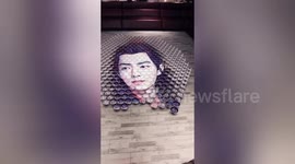 Artist creates incredible 'trick of the eye' paintings in Beijing