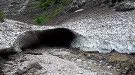 Avalanches and rivers form unusual 'ice chapel' below Austrian mountains