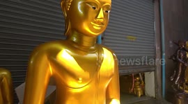 Fascinating street in Bangkok where hundreds of Buddha statues are made