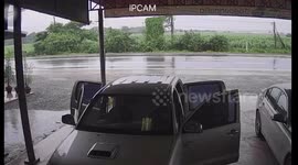 Articulated lorry jackknifes on wet road smashing straight into oncoming car