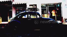 a sequence of 500 volkswagen beetle cars shot from the side in mexico