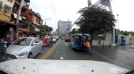 Hilarious moment commuter chases bus while being dragged along the ground