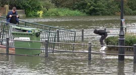 Flooding in southwest London as heavy rain and strong winds hit UK