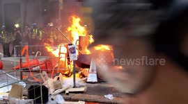 Hong Kong, Wanchai. Protesters lit a large fire on a main road.