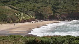 Surfing Waves at Manorbier Beach South Wales