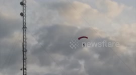 Pair of base jumpers leap from 1,200ft mast in east England