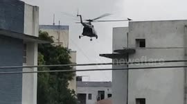 Helicopters drop food packets on rooftop of flood-hit areas in northern India