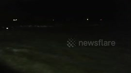 Extremely high tide above flood defences in Cleethorpes, Lincolnshire, UK