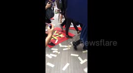 Hong Kong protesters stomp on official Chinese National Day signs