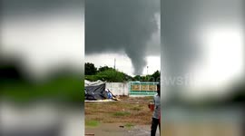 Tornado-like cloud formation startles onlookers in western India