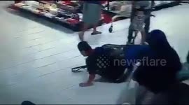 Brave shop assistant takes down suspected thief like a Hollywood action hero