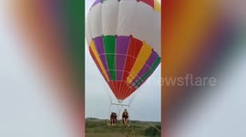 Mom and son killed after falling from tethered balloon in eastern China