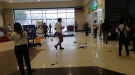 Shopping mall damaged after strong winds and rain in the Philippines