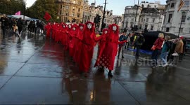 Women Dress In Red as Part Of The Extinction Rebellion Protest