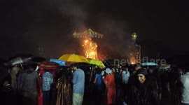 Crowds gather to watch 50-foot effigies of Hindu legends burn during Dussehra celebrations