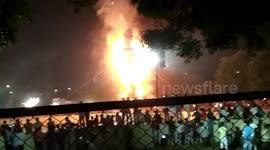 Devotees in India ignite massive 50 foot effigy to launch Dussehra festival