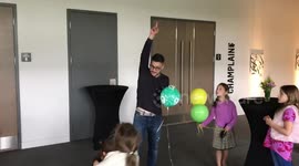 Dad comes up with creative hack to get a balloon down from the ceiling