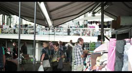 reflection of the encants second hand market in barcelona from the mirrored roof